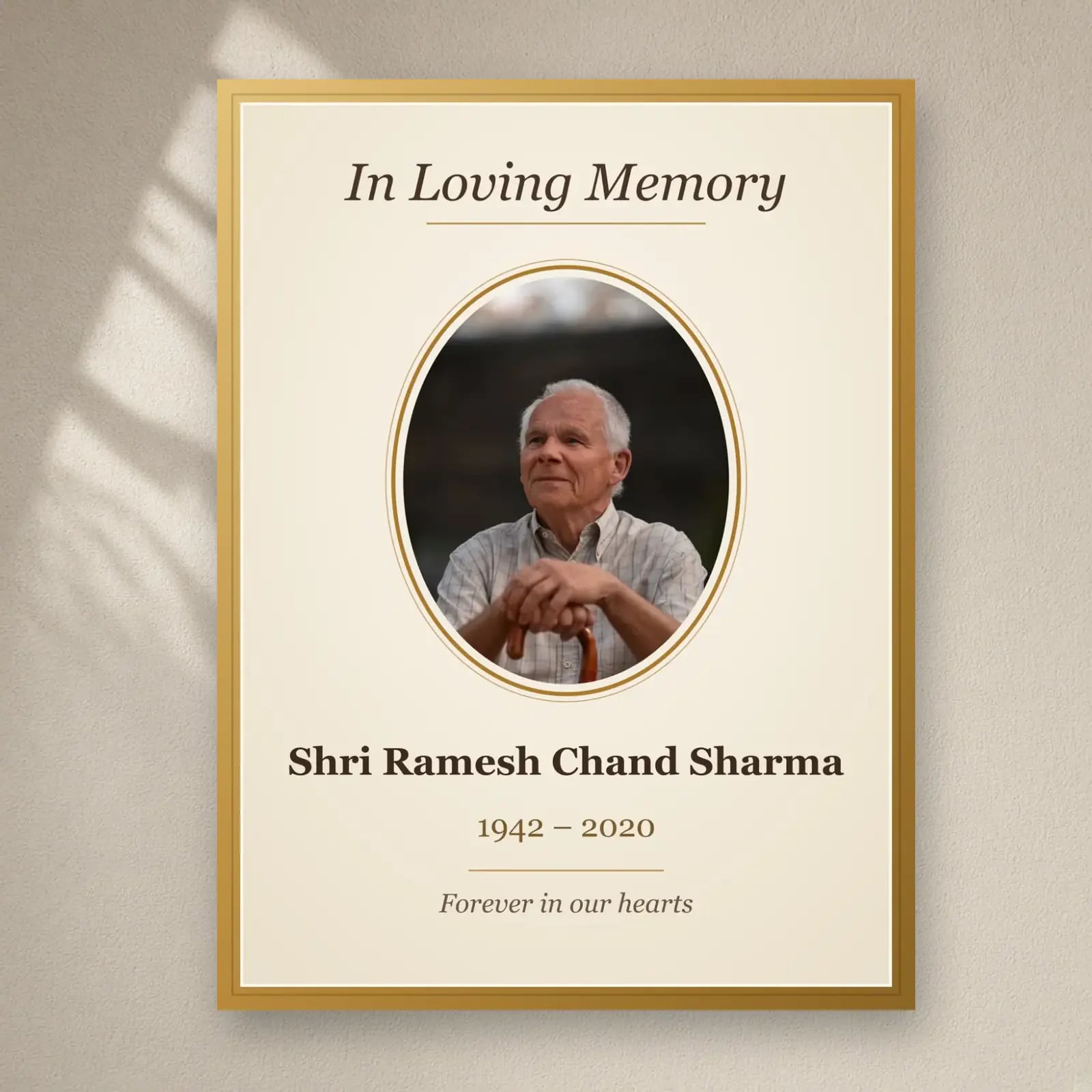In Loving Memory Photo Frame on a plain wall